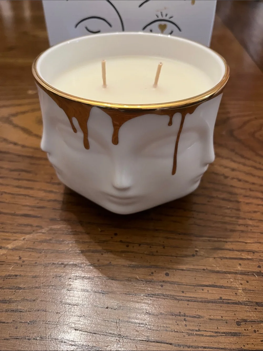 Jonathan Adler Muse Miel Double-Wick Candle in white porcelain